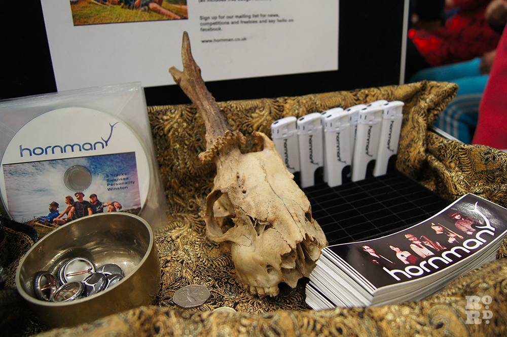 Suitcase containing sheep skull, Hornman pins, Horman CDs.