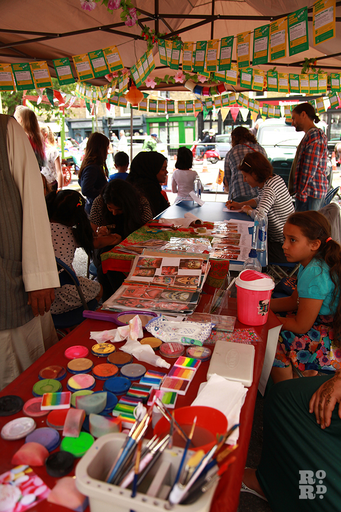 Craft corner tent, with face painting and cookie decoration, at Roman Road Festival