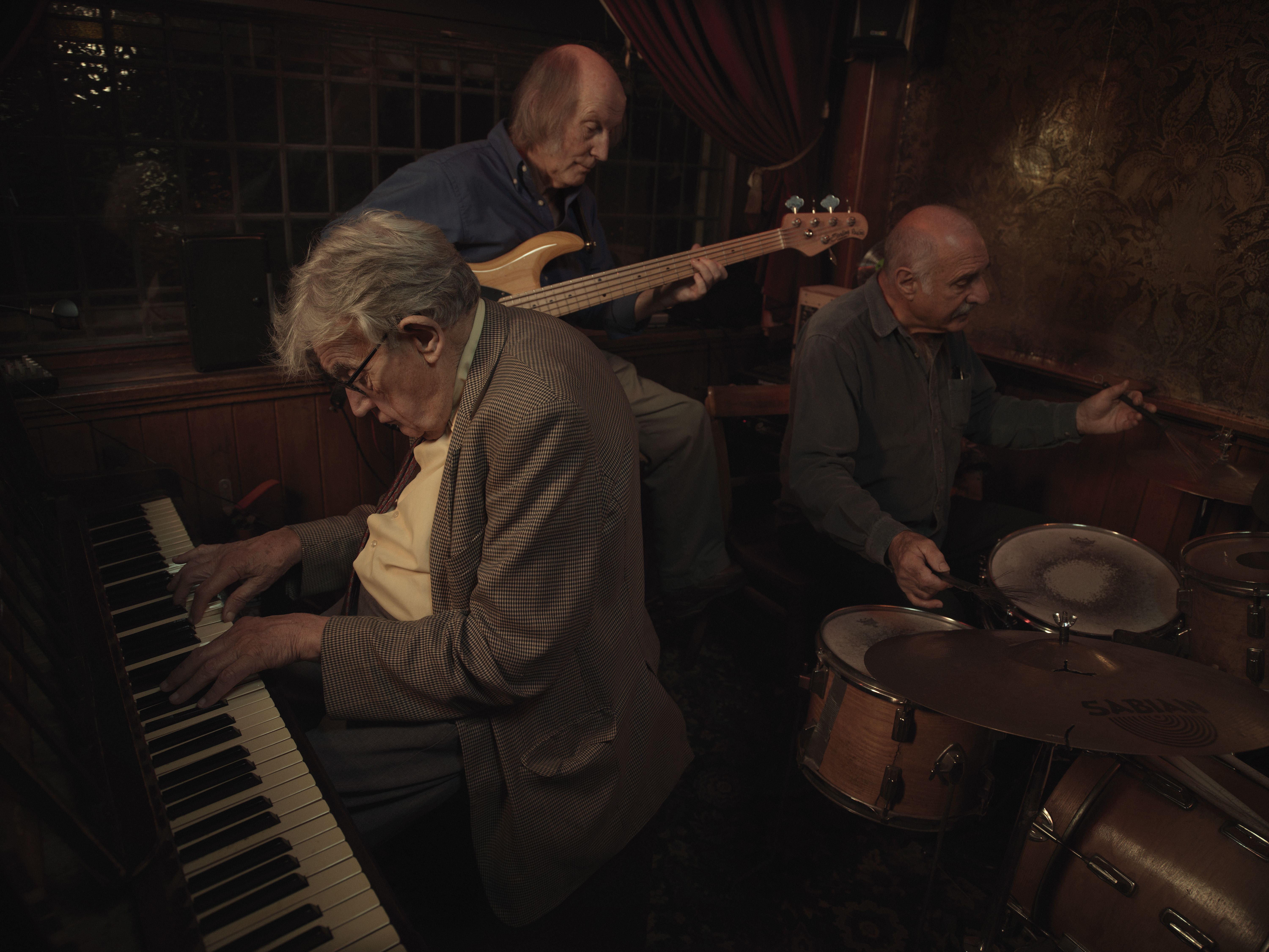 Band of crooners, piano in pub. Image from Last of the Old Crooners, Palm Tree pub by Tom Oldham