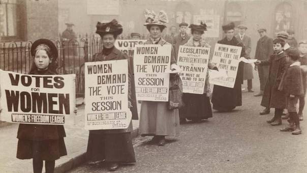 Suffragettes marching in East London