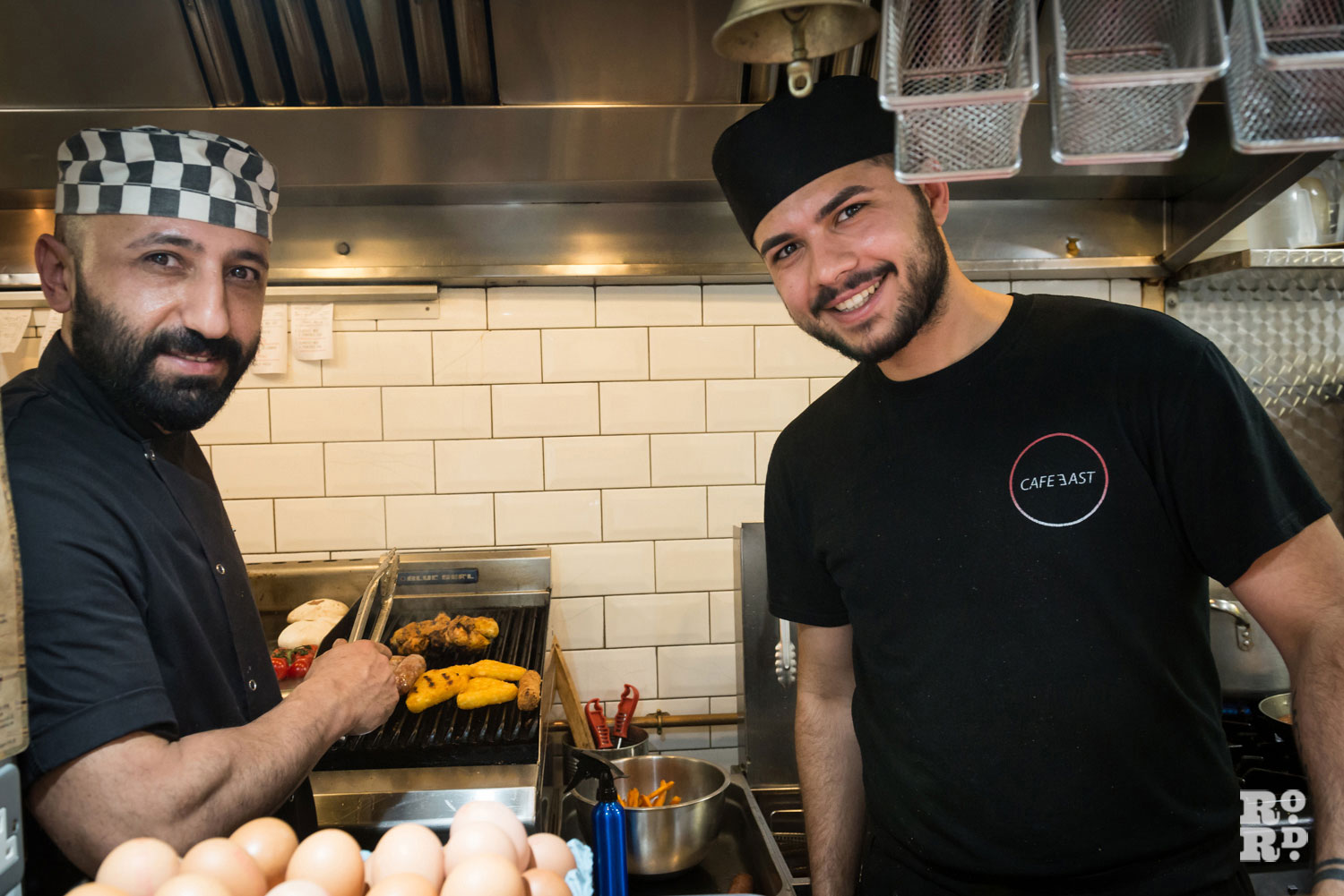Chefs cooking brunch Cafe East Roman Road