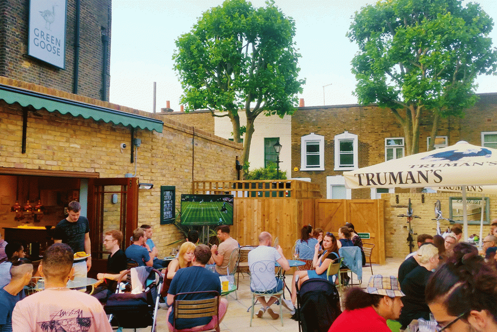 Beer garden in the sun at the Green Goose in East London