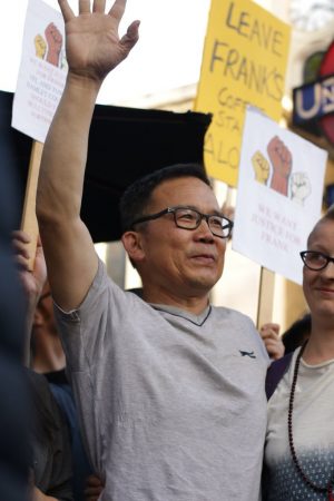 Frank Wang at a protest in Bethnal Green