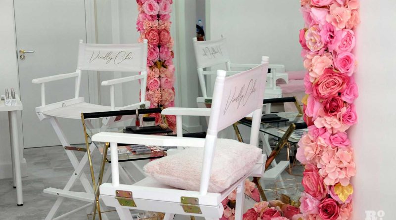 Treatment chairs surrounded by rose garlands at Vividliy Chic lash bar on Roman Road, Bow, East London