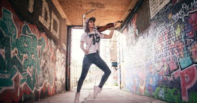 Tanya Cracknell aka The Grime Violinist jumping in a tunnel in Bow, East London