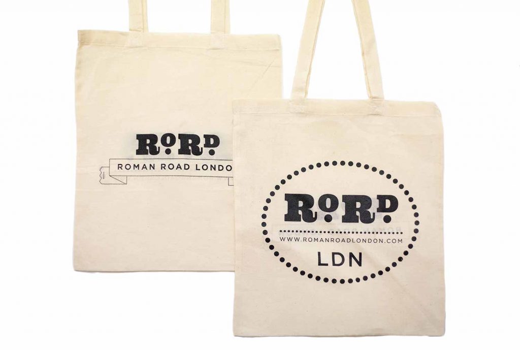 Back and front of natural Roman Road LDN shopping top bag.