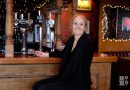 Claire Ashbridge Thomlinson founder of East London Brewery enjoying a half pint of Nightwatchman at The Florist pub