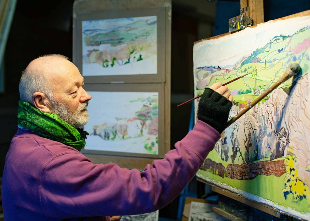 Jon George painting in his studio, Chisenhale Arts