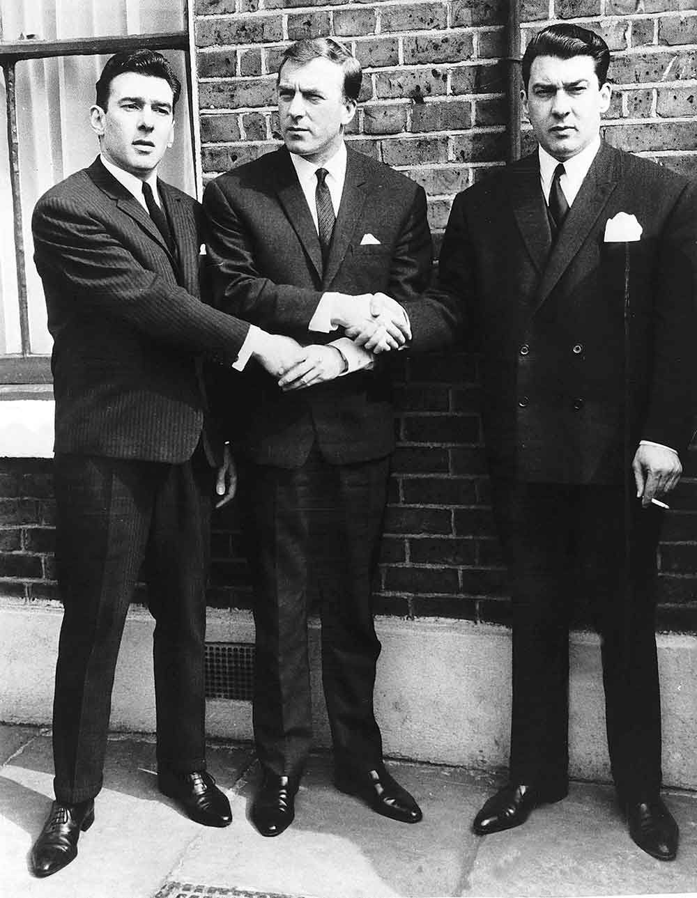 The Kray Twins shaking hands