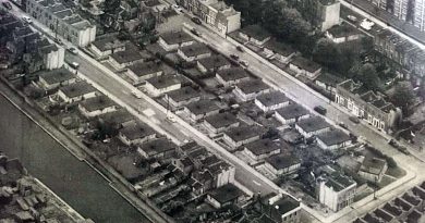 Rows of pre-fab buildings in Mile End Park, London, where the Eco Pavilion now stands