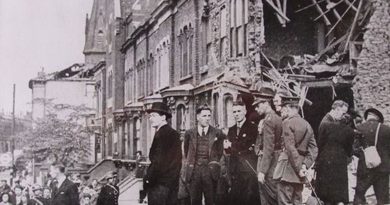 Mayor of Poplar inspecting Blitz damage, with St Barnabus Church in the background, 1942