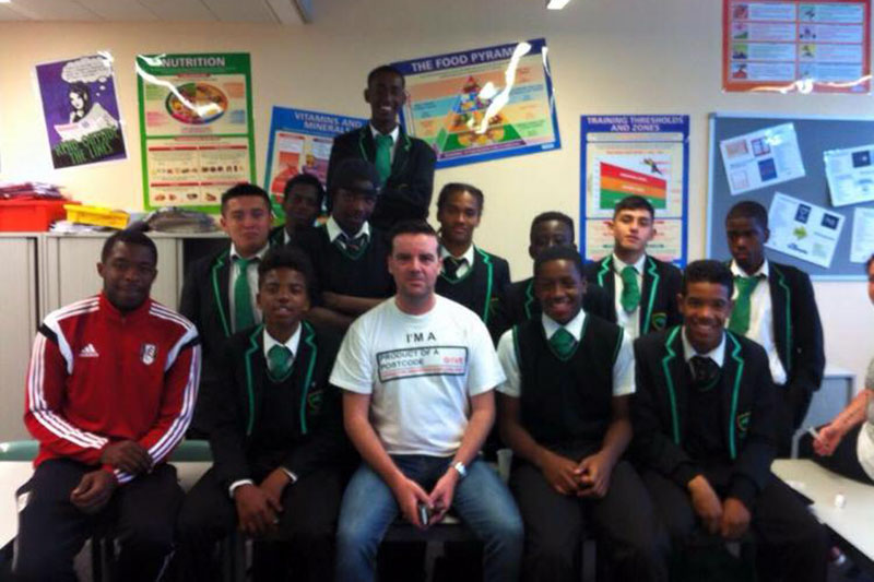 Gary Hutton with school children from Tower Hamlets