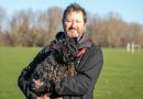 Douglas Thackway with his dog Martha, in Victoria Park, East London