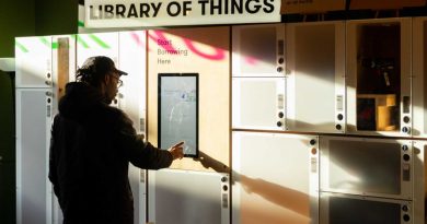 Borrower accessing kiosk at Library of Things, opening in Hackney Wick.