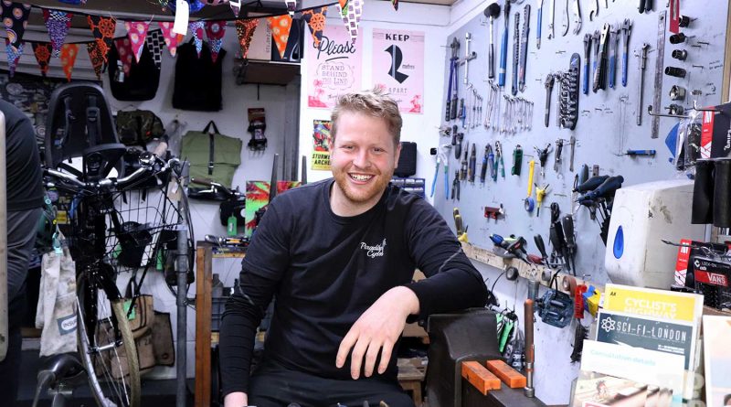 Owner Louis Wigston in his cycle repair shop Paradise Cycles, Roman Road.
