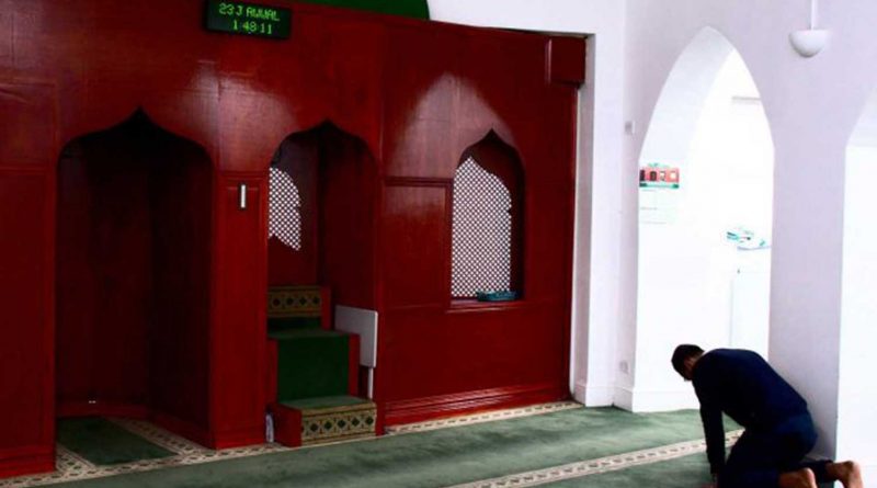 A man praying at the Bow Muslim Community Centre.