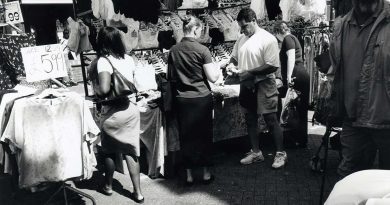 Buying underwear on Roman Road Market, 1999.