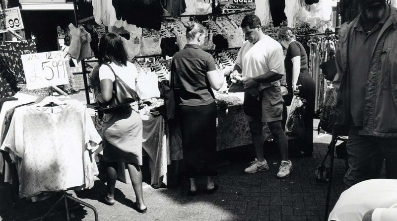 Buying underwear on Roman Road Market, 1999.