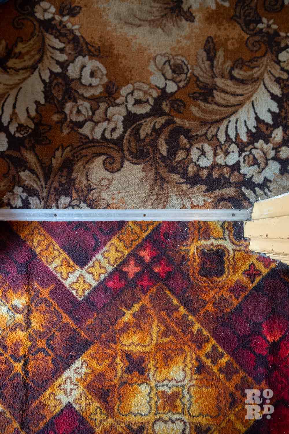 Patterned dark brown and floral 1970s carpet in a house on Lichfield Road, Bow, East London