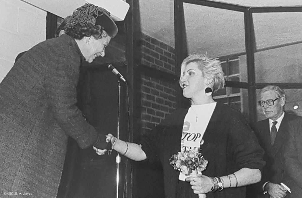 Queen Elizabeth congratulates a student of Queen Mary University in East London in 1988