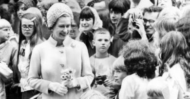 Queen Elizabeth in a crowd of children at Victoria Park, East London, in 1977