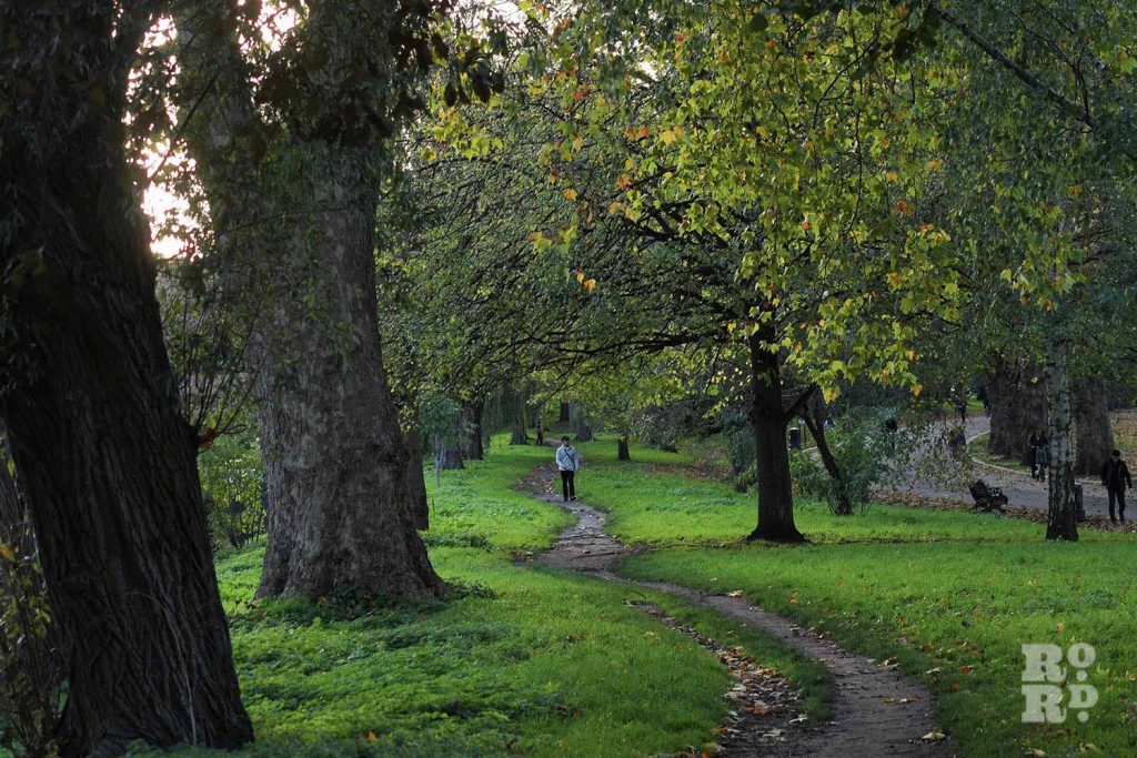 Path along the canal, Victoria Park in autumn, East London, 2022.