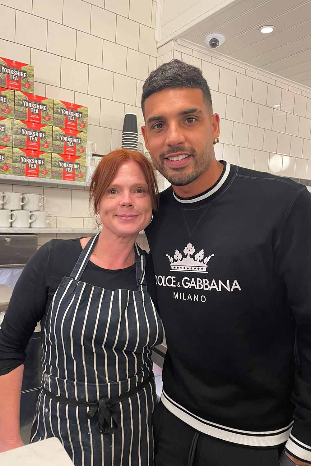 West ham footballer Emerson Palmieri and G Kelly employee Leanne in G Kelly pie and mash shop on Roman Road
