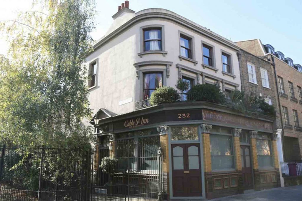 Cable Street Inn exterior with trees to the left hand side.