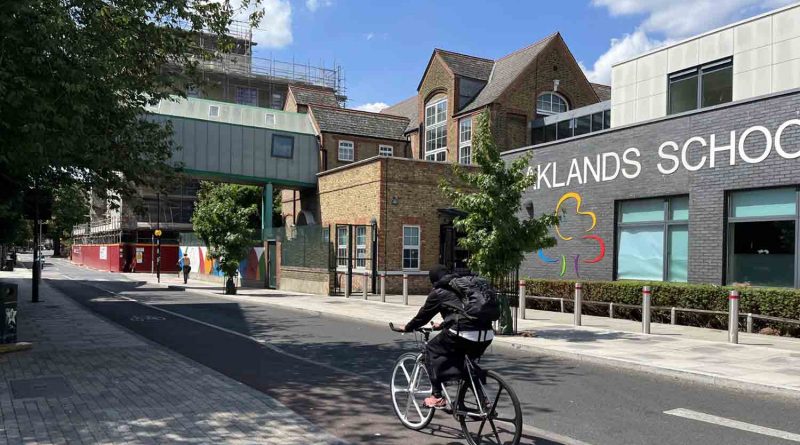 Cyclist in front of Oaklands School on Old Bethnal Green Road liveable street scheme.