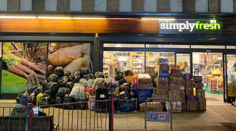 Simply Fresh supermarket on Roman Road with donation boxes and bags for Turkey stacked outside