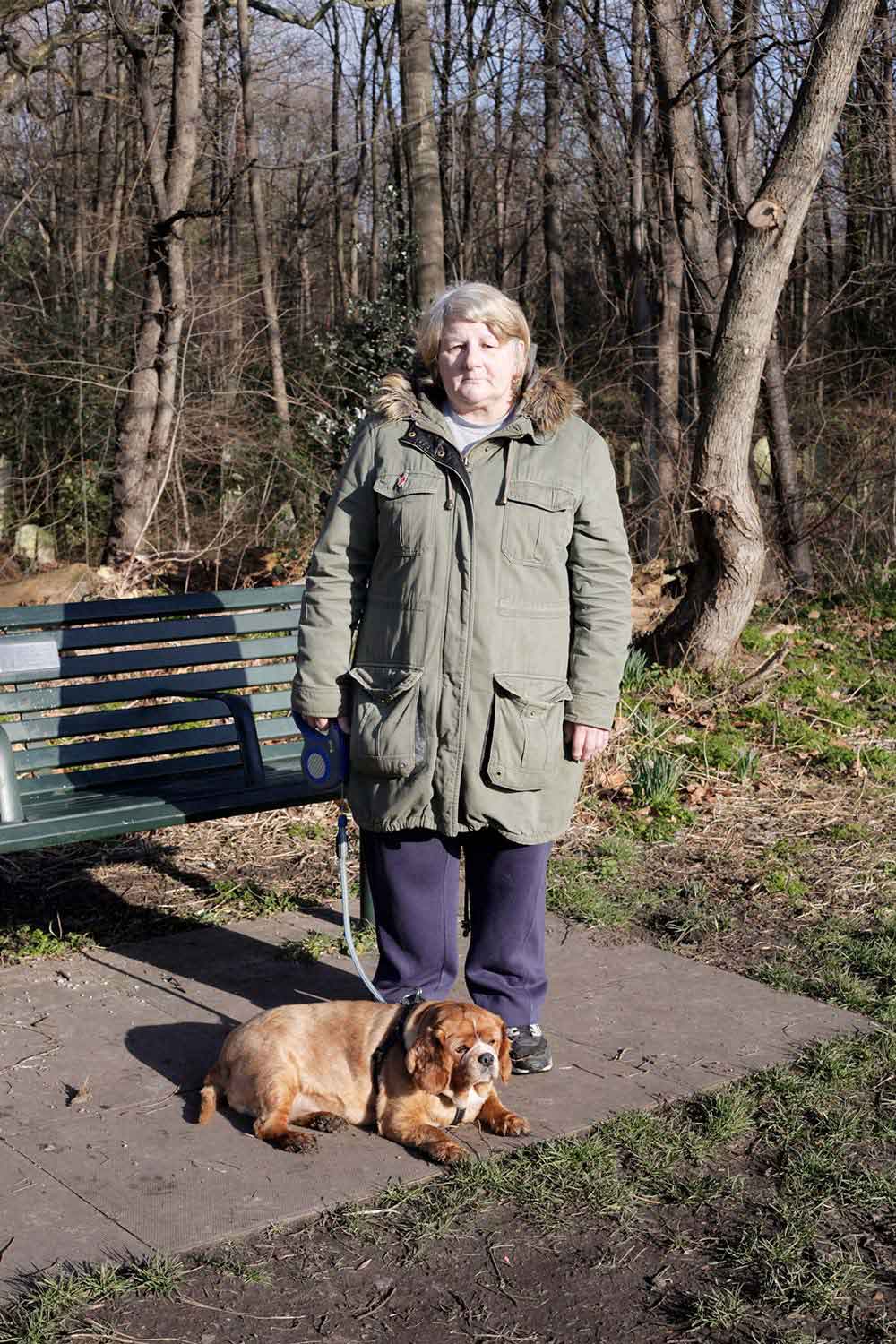 Sharon and Lucky, dogs and their owners at Tower Hamlets Cemetery Park, East London.