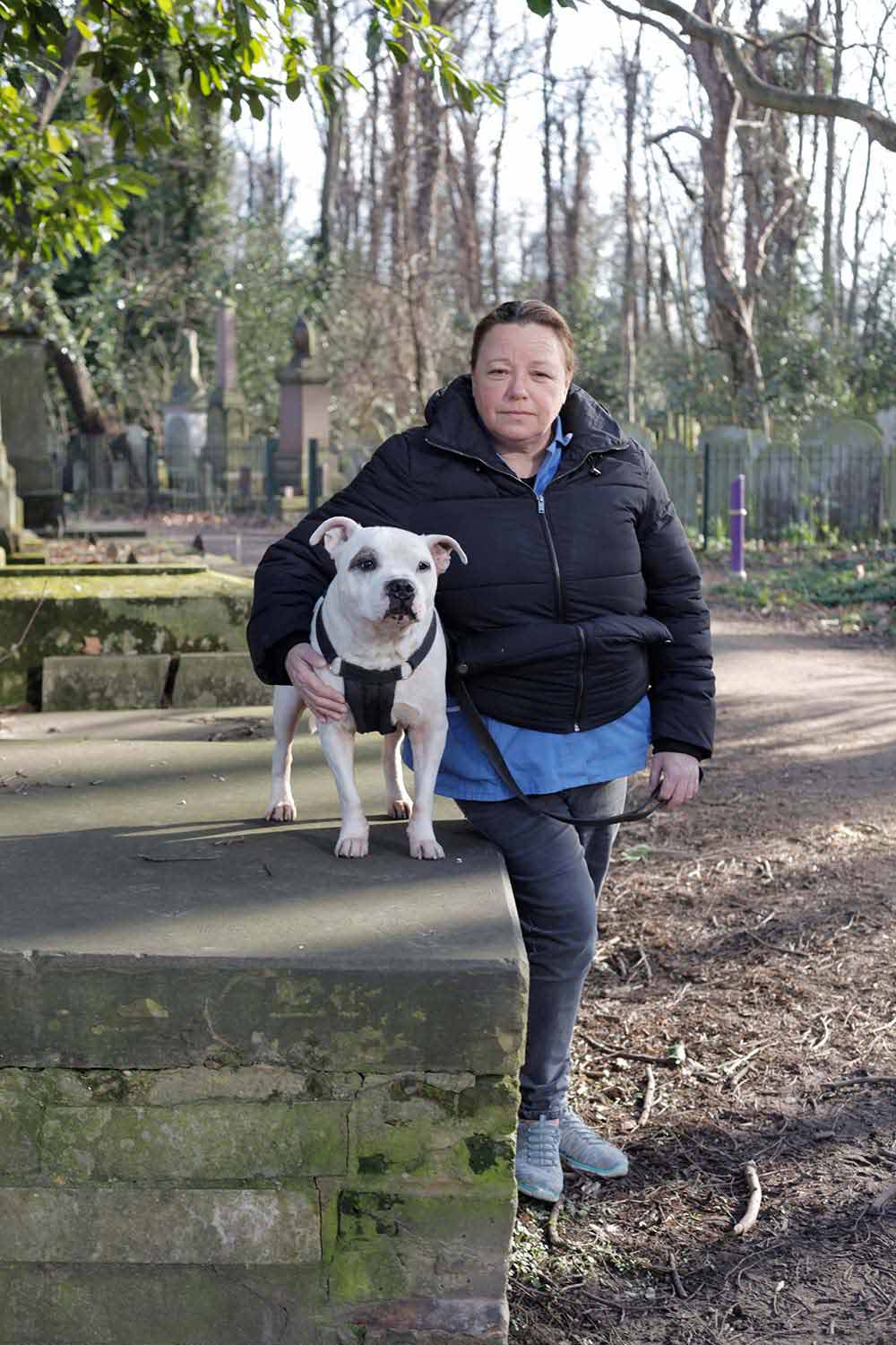 Tania and Patch, dogs and their owners at Tower Hamlets Cemetery Park, East London.