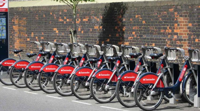 Row of Santander Cycles in a docking station.