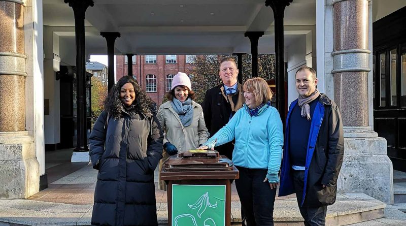 Photograph of Labour Councillors on the launch day of the Bow Quarter pilot in food waste collection in East London, from left to right: Councillor Amina Ali, Councillor Rachel Blake, Estate Manager Fred Faulkner, resident Liz Aitken and Councillor Marc Francis.
