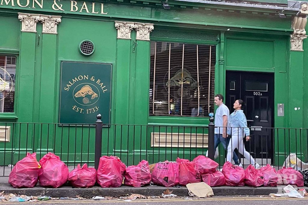 Piles of uncollected rubbish outside the Salmon and Ball pub in Bethnal Green, during the Tower Hamlets refuse worker strikes in September 2023.