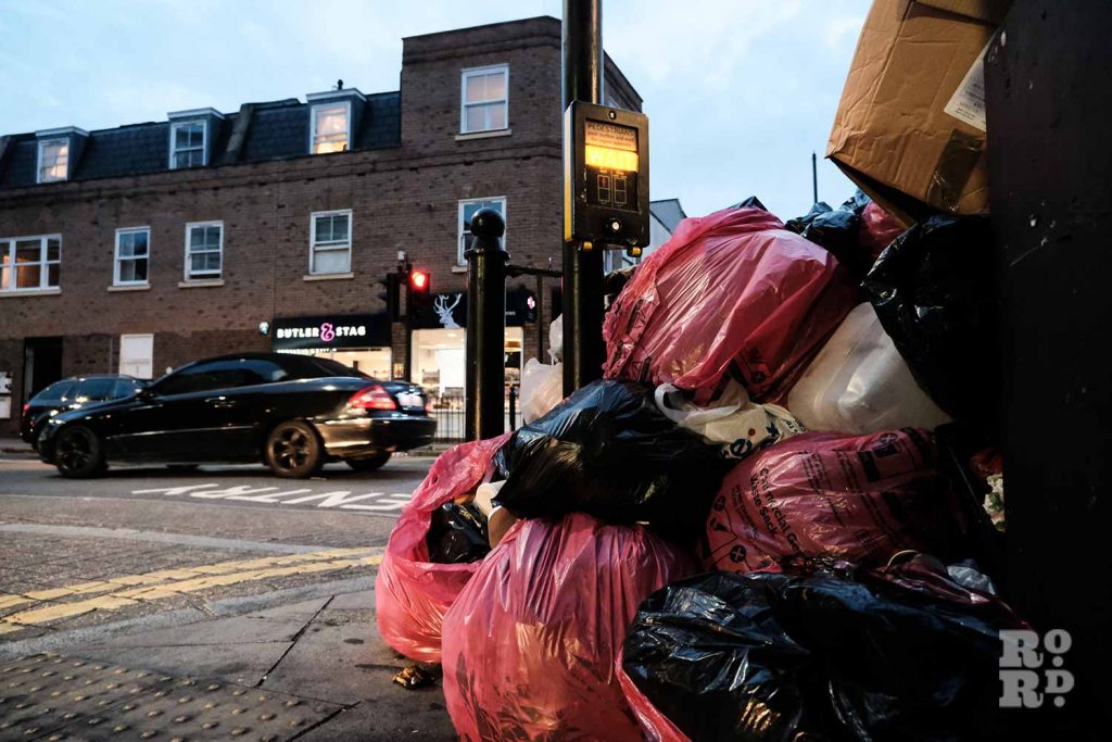 Outside the Albert pub, piles of rubbish during the Tower Hamlets refuse worker strikes in 2023.