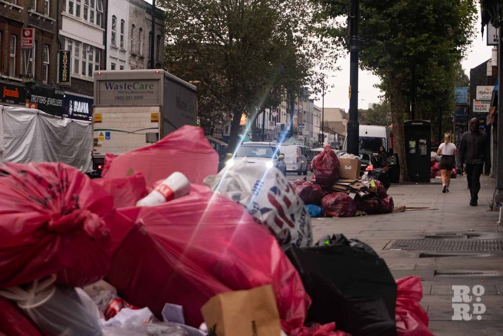 Bethnal Green Road piles of rubbish during the Tower Hamlets refuse worker strikes in 2023.