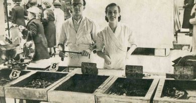 Two people on Eel Stall. G Kelly, notable eel and pie shop.