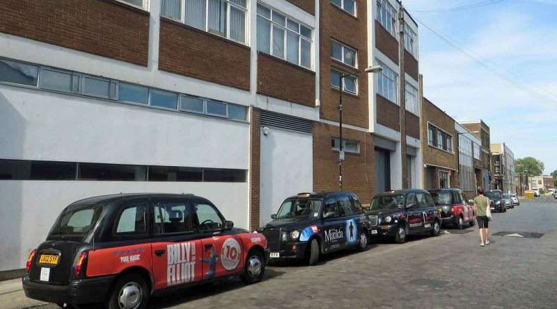 Black cabs on Vyner Street, East London.