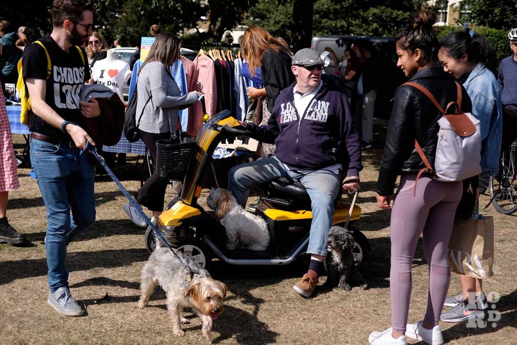 Group of dogs and their owners at Victoria Park Dog Show, East London