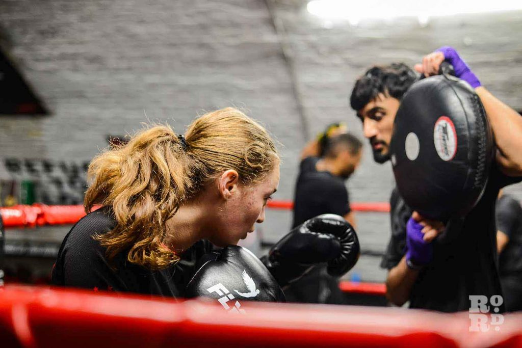 Female boxer training at KO Combat Academy 