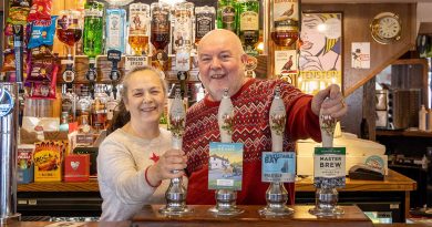 Landlords Frankie and Leslie, behind the bar, saying goodbye as they retire from The Eleanor Arms.