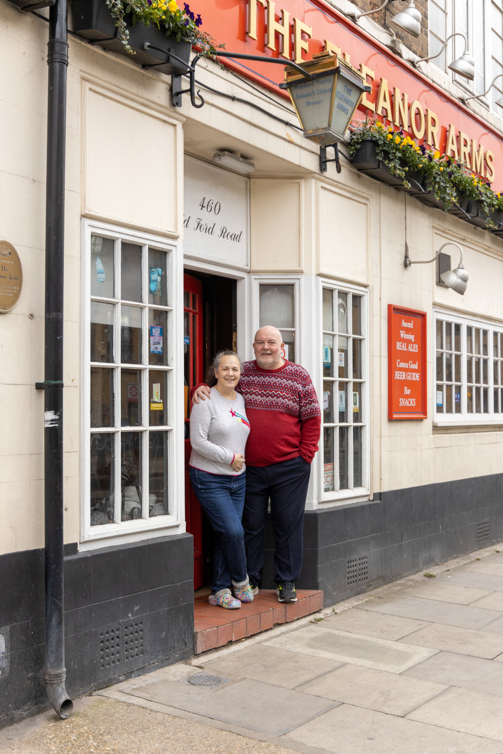 Landlords Frankie and Leslie standing outside The Eleanor Arms, shortly before retiring.