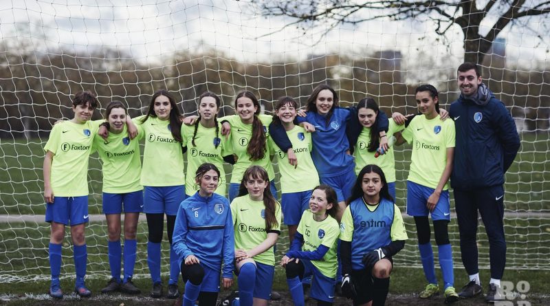 Team in goal, Vicky Park Rangers girls football team, Victoria Park, East London