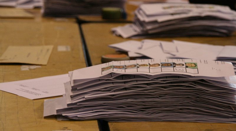 A pile of ballot papers being counted at the election count.