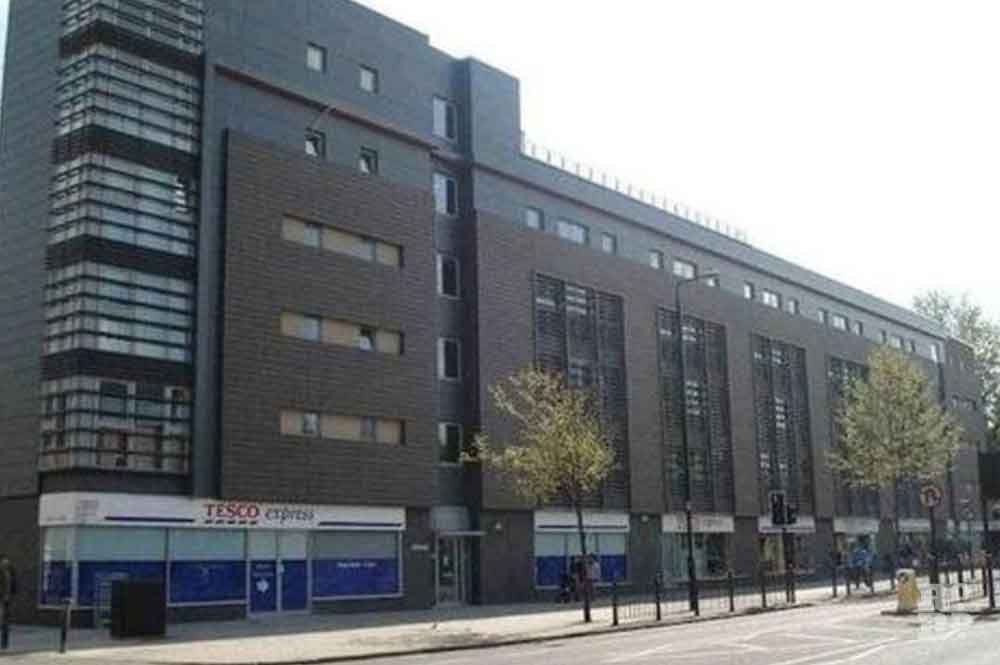 Merchant's Quarter on Bow Road, with Tesco occupying the ground floor retail unit.