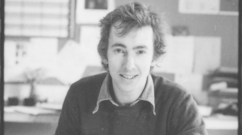 Acme co-founder Johnathan Harvey sitting at his desk at the Acme Gallery, 1977.