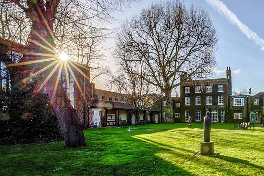 The quad at St Katharine's Precinct on a sunny winter's day, Limehouse, east London.